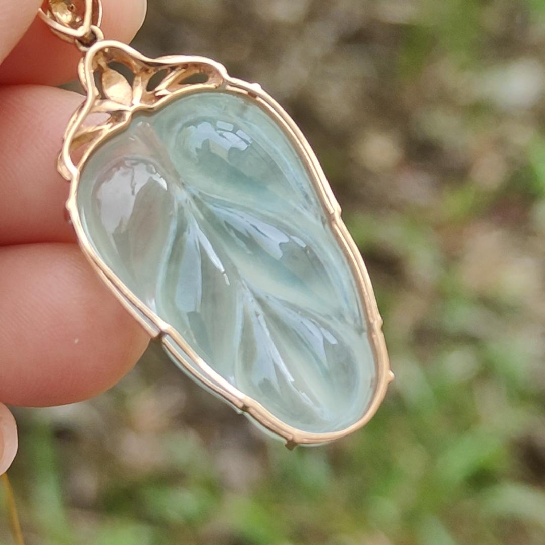 Premium Quality Icy Translucent Light Green Hue Natural Type A Jadeite Jade crafted as Leaf set on 18k Gold as Pendant, certificate weighs 5.07 grams, measurement 40.5 * 18 * 7.5 mm (18kp42)