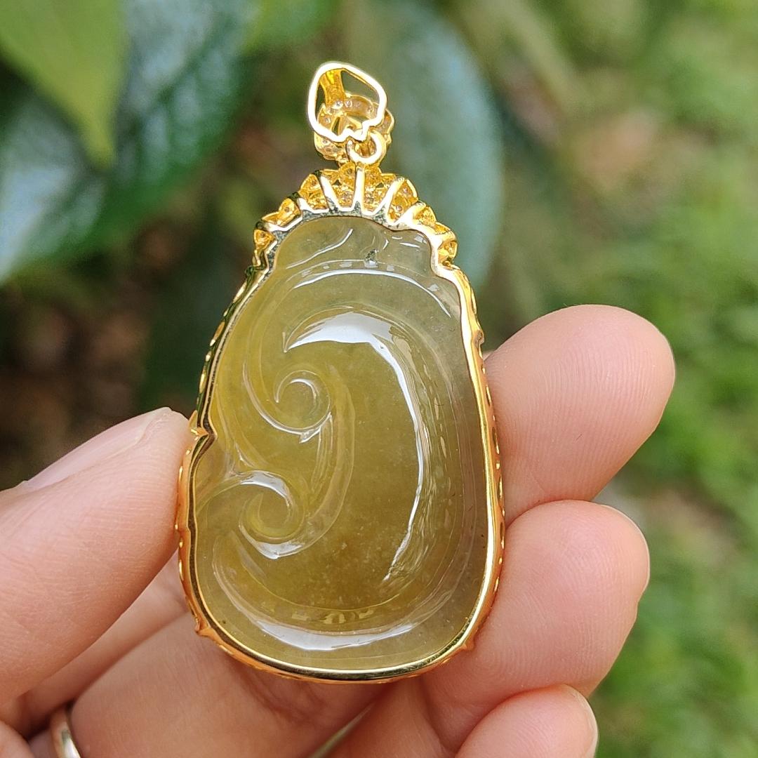 Premium quality Yellow Natural Type A Jadeite Jade set on 18k Gold with diamonds as a pendant necklace with certificate weigh 8.58 grams, measurement 47.6 * 25.5 * 7mm (18kp11)