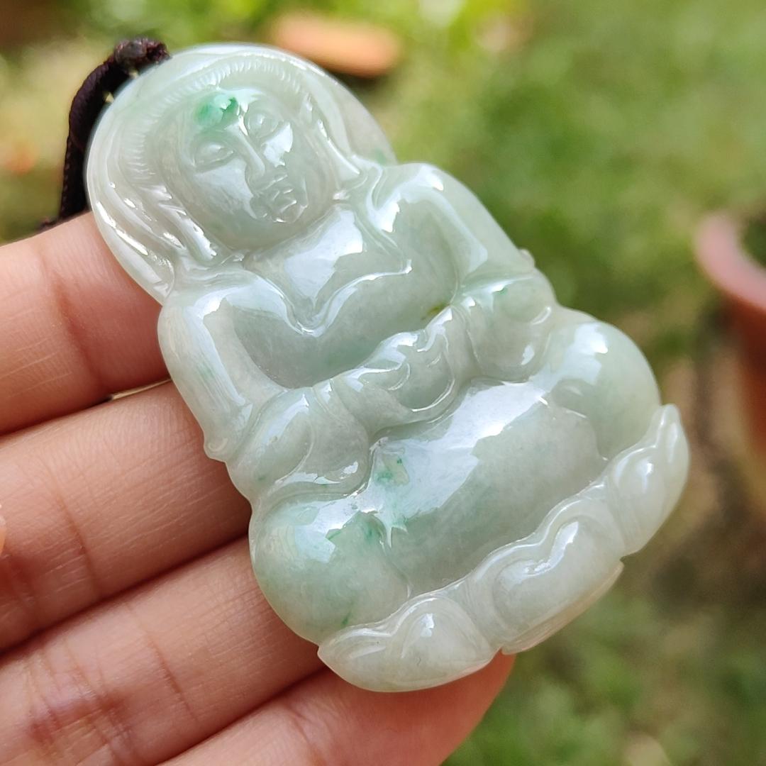 Light green with green patches Natural Type A Jadeite Jade crafted with Guanyin as Pendant with certificate weigh 17.28 grams, measurement 56.3 * 37.3 * 5.9 mm (pendant201)