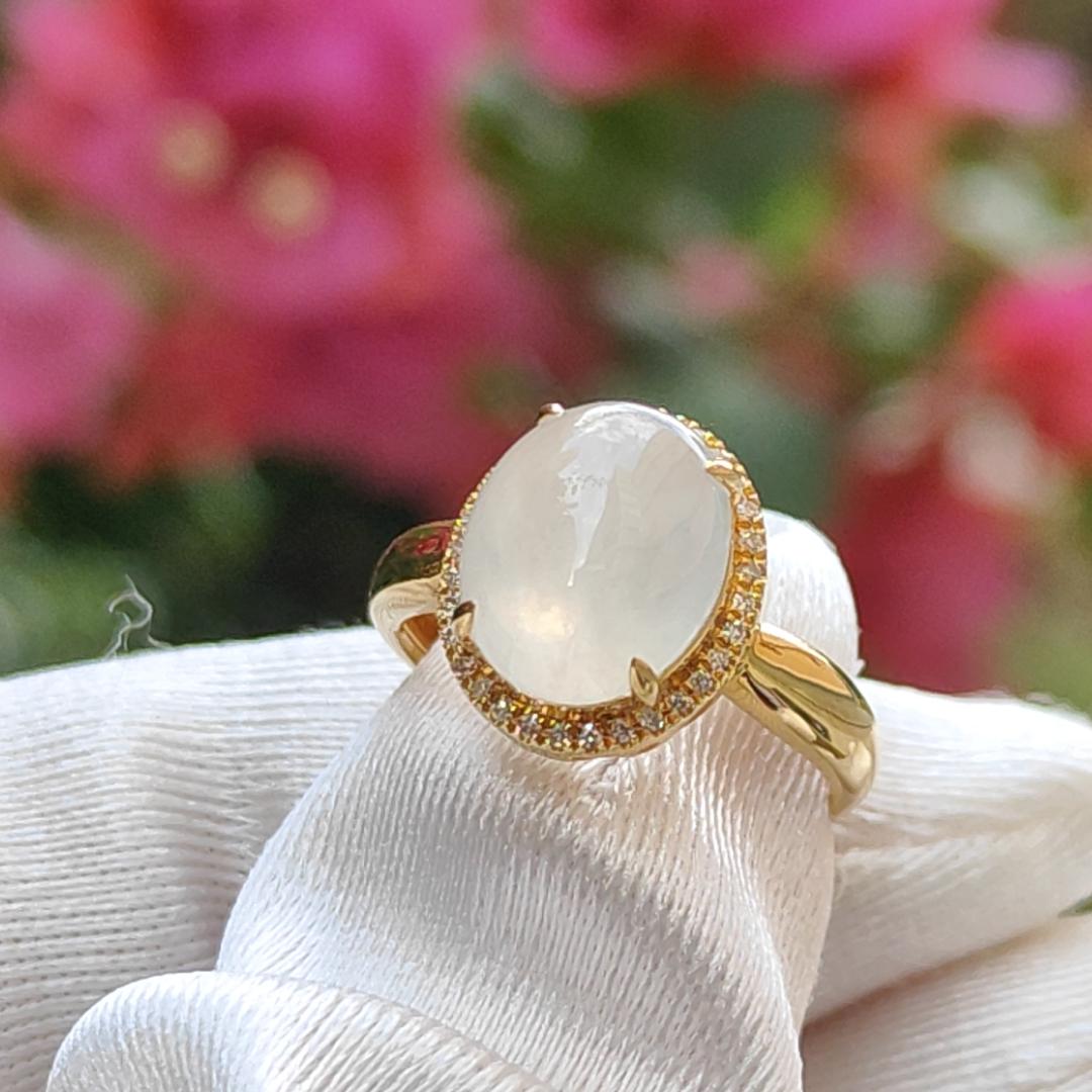 Icy Translucent Premium Quality Natural Type A Jadeite Jade crafted as Oval Cabochon set on 18k gold with diamonds as Ring with certificate weigh 2.54 grams, Finger Size 15mm, Measurement 9.9 * 8.2 * 4.5 mm (18kring22)