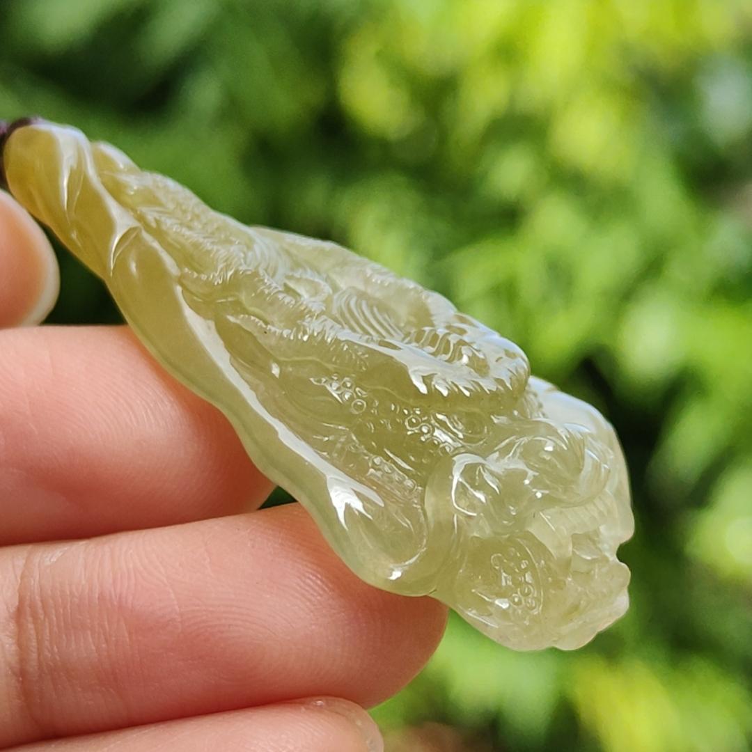 Premium Icy Yellow Natural Type A Jadeite Jade crafted with Dragon as Pendant certificate weighs 15.64 grams, measurement 50.6 * 27 * 11.5 mm (pendant253)