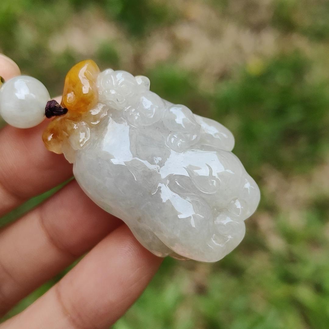 Unique Yellow Ruyi Chayote Natural Type A Jadeite Pendant with QIC approved labs certificate weight 25.27 grams, 40 * 25 * 15.20 mm originate from Myanmar very suitable for daily wear (pendant119)