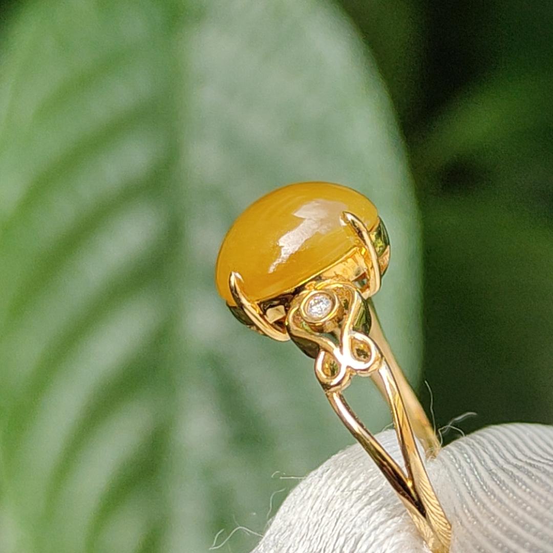 Yellow with a bit reddish Natural Type A Jadeite Jade Cabochon 8.6 * 7 * 3.6 mm set on 18k Gold as Ring adding 2 diamonds with certificate weigh 2.08 grams, finger size 16.8 mm (18kring13)