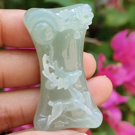 Highly Translucent faint green Old Mine with Specific Gravity 3.34, Carved as deer with very fine grain and good translucency Natural Type A Jadeite Pendant / Collection with NGI Gemstone report weight 140.16 grams, 47.50 * 26.75 * 13.29 mm (pendant131)