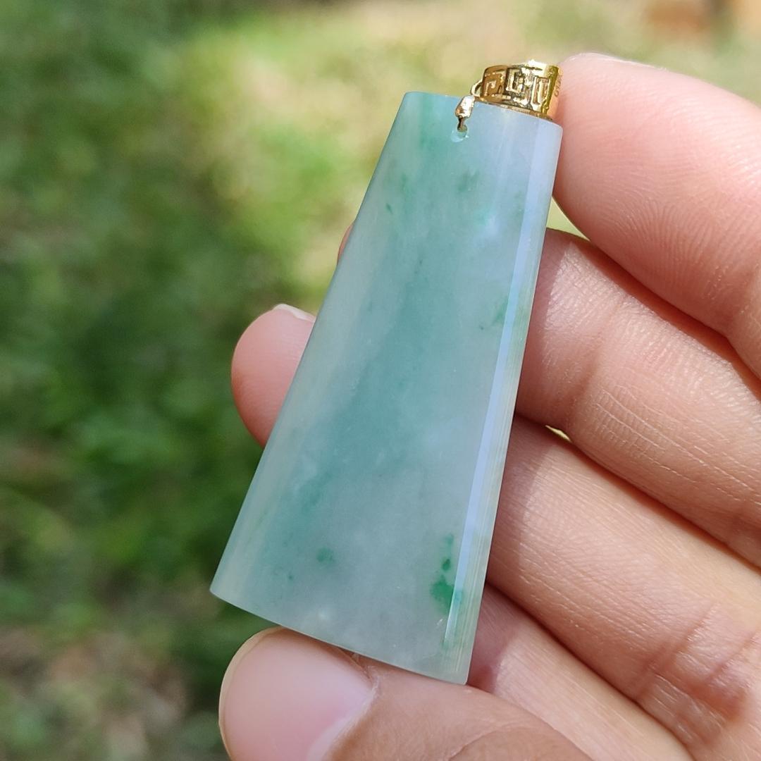 Light Green with Green Patches Natural Type A Jadeite Jade Crafted with Nothing as a pendant attached with 18k gold clasp, certificate weigh 11.24 grams, measurement 40.2 * 21 * 7.1 mm (18kp21)