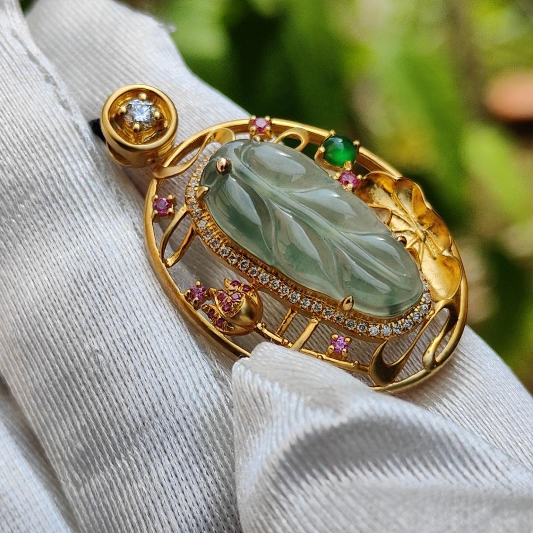 Premium Quality Icy light green with patches Natural Type A Jadeite Jade crafted as Leaf set on 18k Gold with 1 Green Cabochon and Diamonds, Certificate included weigh 4.36 grams, Measurement 35.3 * 22 * 8.2 mm (18kp25)