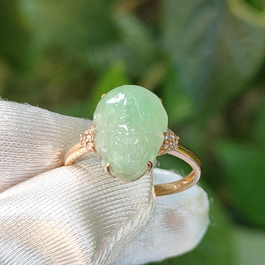 Good Quality Natural Type A Jadeite Jade crafted with light green pixiu set on 18k gold as Ring with certificate weighs 2.58 grams, measurement 12.1 * 9.6 * 5.3 mm (18kring24)