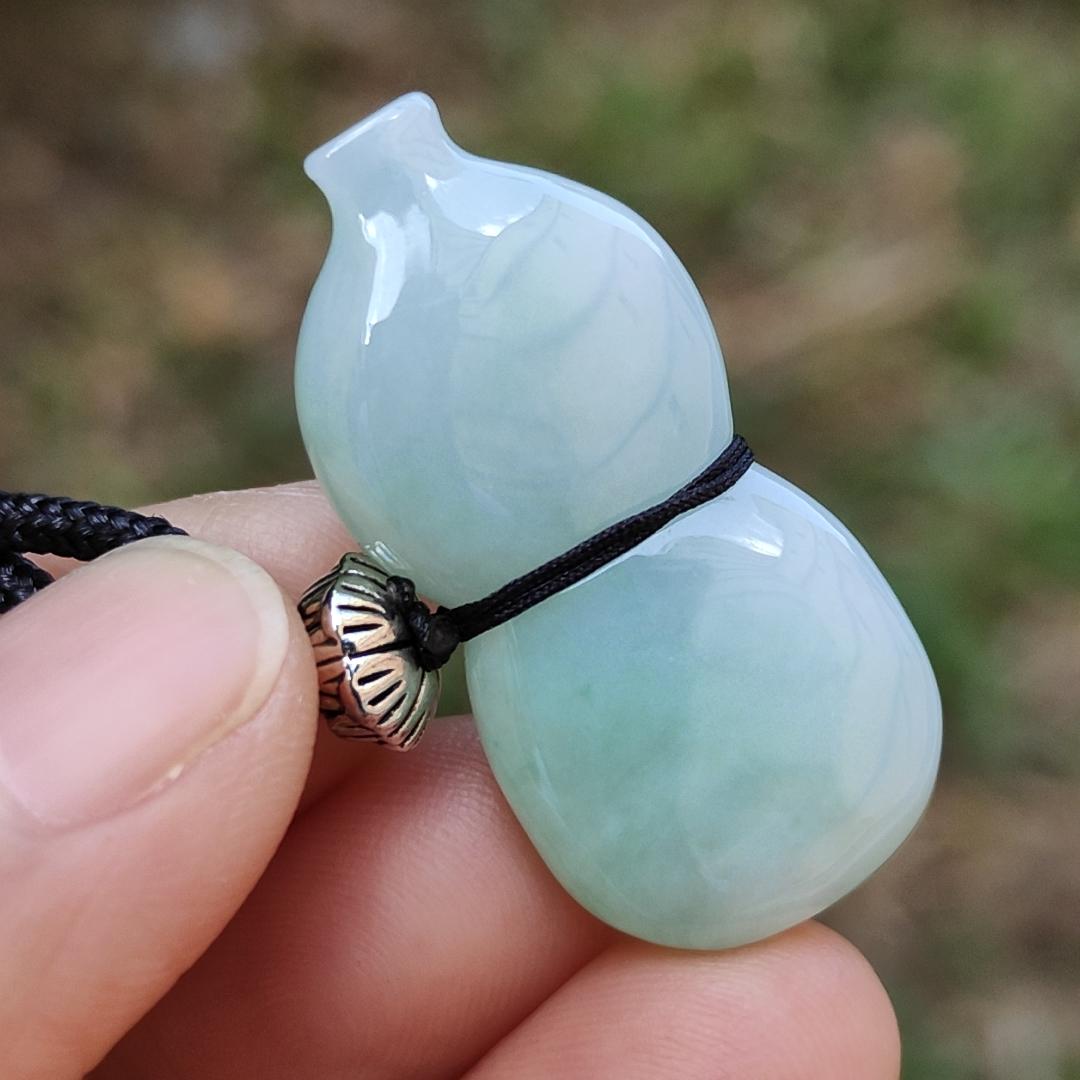 Light Green Natural Type A Jadeite Jade crafted with shape of Gourd as Pendant, certificate weighs 8.42 grams, measurement 32.9 * 16 * 8.4 mm(pendant252)