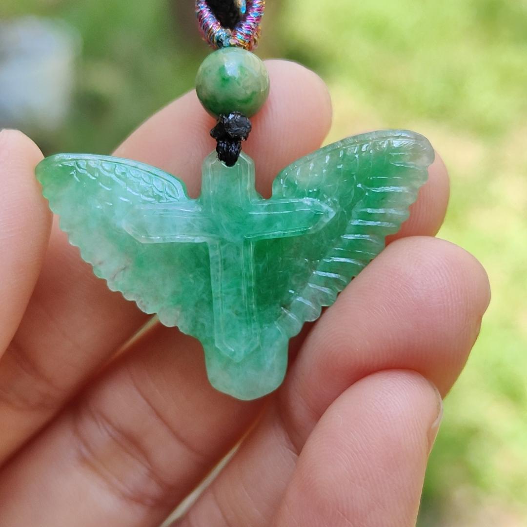 Green Jadeite carved as Angel (Front) and Cross (back) Natural Type A Jadeite pendant with NGI Gemstone report weight 6.33 gram , 35.39 * 23.76 * 5.61 mm with Translucent fine grain crystal aggregate granular and fibrous interlocking texture (pendant139)