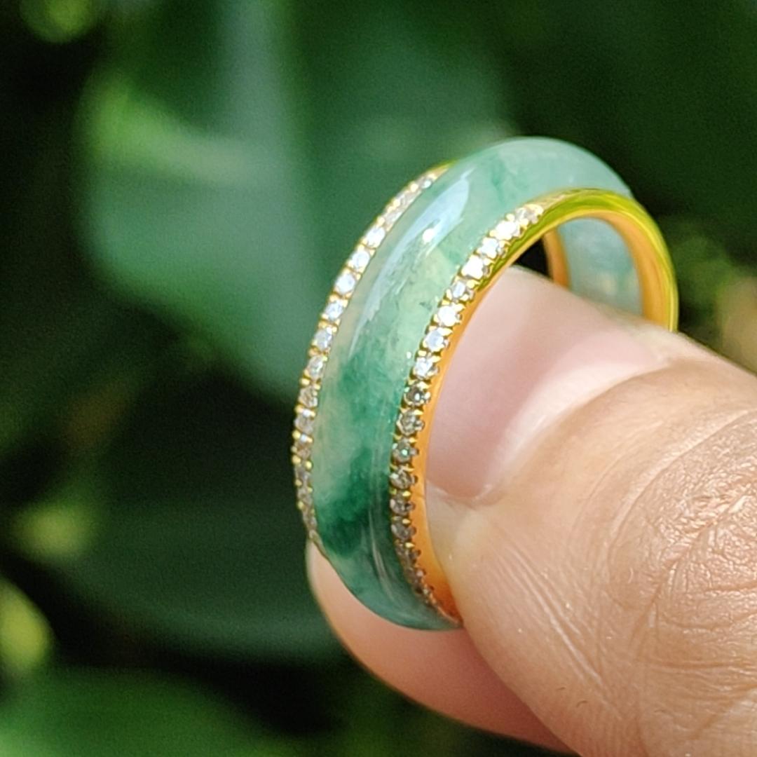 Icy Translucent Green Floating Patches Natural Type A Jadeite Jade crafted as Ring designed with removable 18k Gold, certificate weighs 4.65 grams, measurement 6.3 * 2.9 mm, finger size 17.1 mm (18kring29)