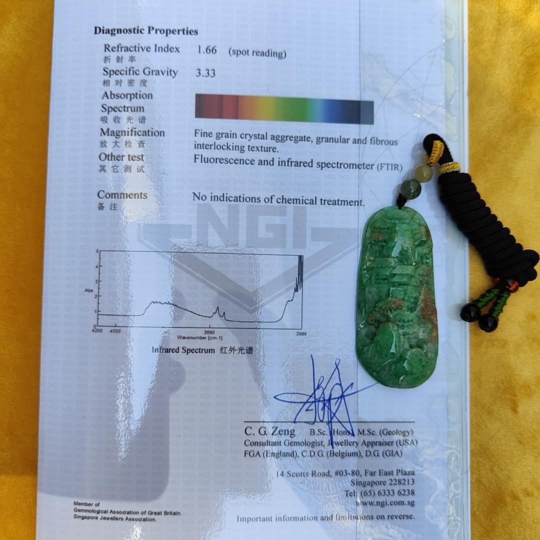 Green with patches of light brown Translucent Natural Type A Jadeite Pendant carved with scenery with NGI Gemstone report weight 126.07 grams, 60.73 * 27.79 * 9.53 mm , fine grain crystal aggregate, granular and fibrous interlocking texture (pendant142)