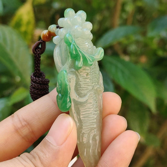 With Green and Light Green Ginseng Ruyi Natural Type A Jadeite pendant come with certificate weight 40.59 grams, 72.30 * 24.80 * 20 mm meaning Auspicious, representing good luck, happiness, joy, and wealth boosting you wearing it (pendant97)