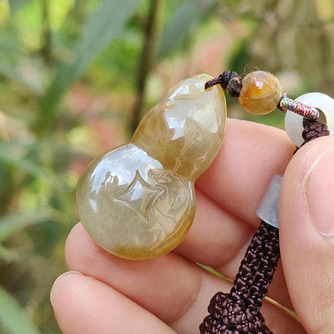 Premium Semi Icy Yellow Natural Type A Jadeite Pendant Necklace crafted as a gourd, symbols of Happiness, wealth, longevity, with certificate weigh 9.16 grams, 32.6 * 18.7 * 10.3 mm, suitable for daily wear or collection purpose