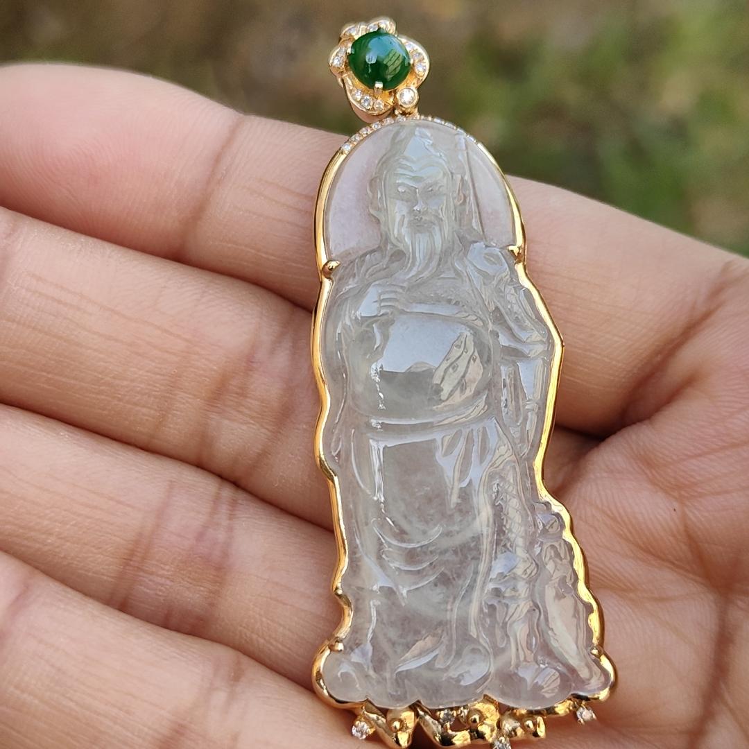 High Quality Light Green and Green Cabochon Icy Translucent Natural Type A Jadeite Jade crafted as Guan Gong set on 18k Gold as Pendant, certificate weighs 8.07 grams, measurement 57.2 * 22.7 * 5.8 mm (18kp46)