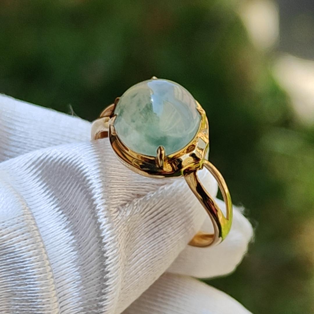 Icy Floating Green Patches Cabochon Natural Type A Jadeite Jade set on 18k gold as a ring with certificate weigh 2.06 grams, measurement 8.9 * 8.8 * 4.2 mm, finger size 16.8 mm (18kring19)