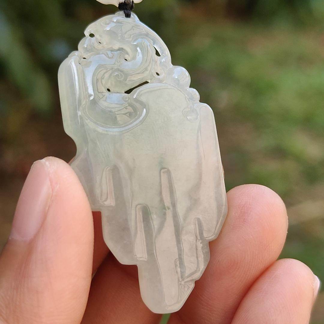 Icy Translucent Natural Type A Jadeite Jade beautifully crafted with old school dragon as pendant, certificate weighs 14.63 grams (pendant246)