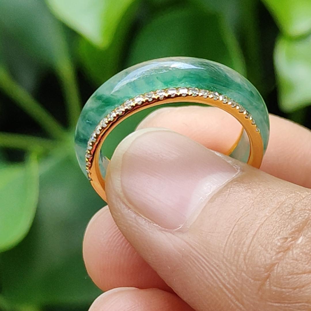 Icy Translucent Green Floating Patches Natural Type A Jadeite Jade crafted as Ring designed with removable 18k Gold, certificate weighs 4.65 grams, measurement 6.3 * 2.9 mm, finger size 17.1 mm (18kring29)