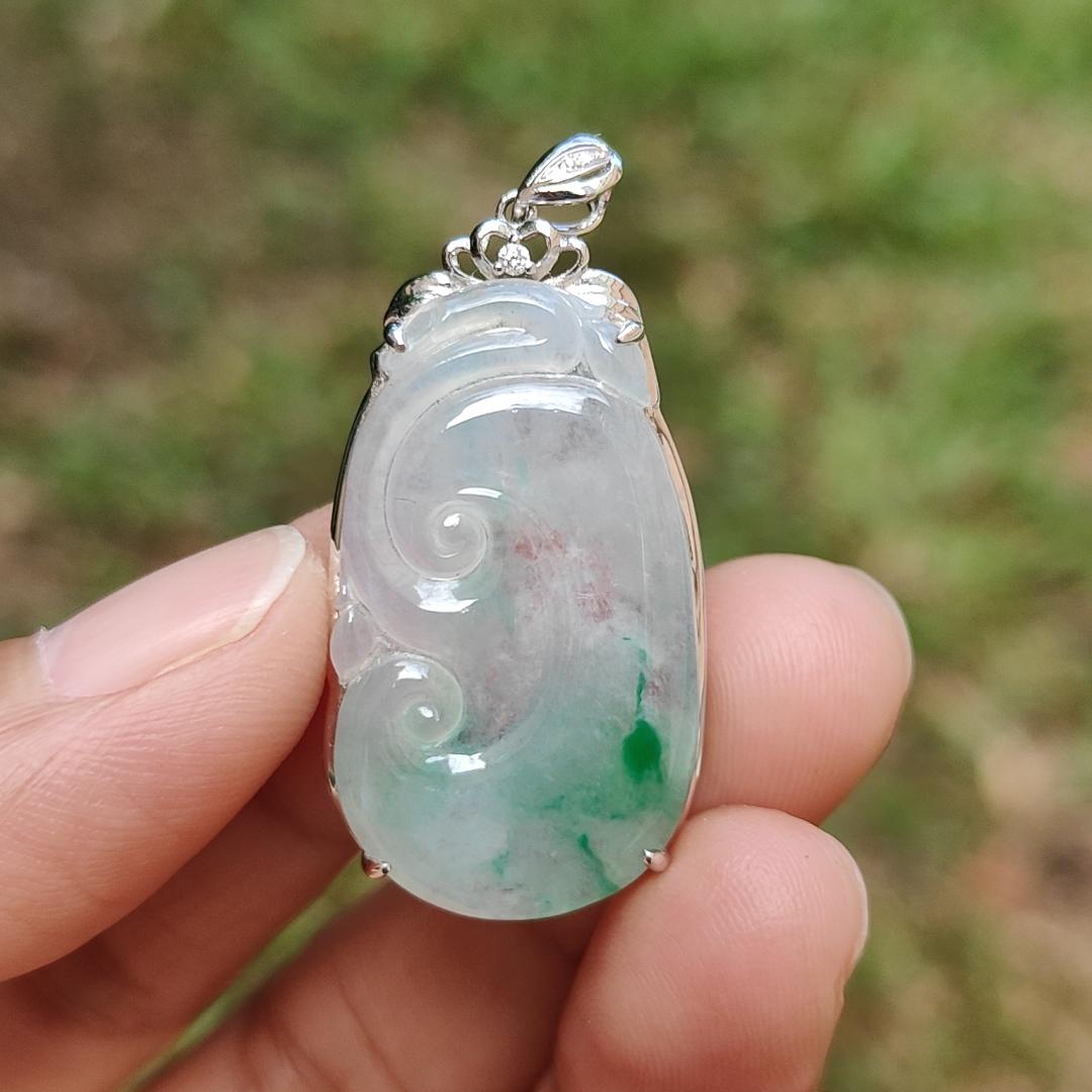 Icy Translucent with Light Green Patches Natural Type A Jadeite Jade crafted with shape of Ruyi set on 18k Gold as Pendant, certificate weighs 4.01 grams, measurement 37.6 * 18 * 5.5 mm (18kp51)