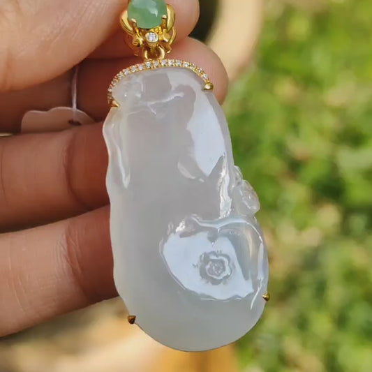 High Quality Icy Translucent Natural Type A Jadeite Jade crafted with flowers added Apple green cabochon set on 18k gold as Pendant, certificate weighs 8.53 grams, measurement 47.3 * 20 * 5.8 mm (18kp55)